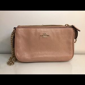 Pinkish leather Coach wristlet